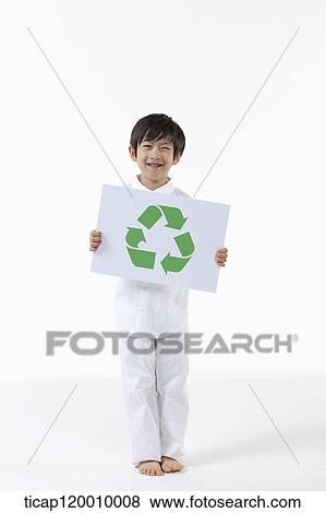 Stock Photo - A boy with recycling symbol . Fotosearch
