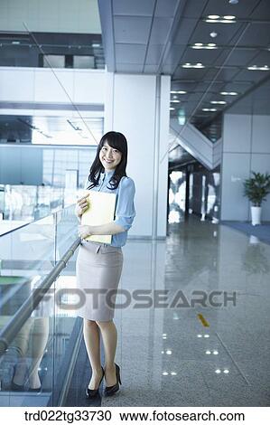 A business woman with the document file View Large Photo Image Stock Image - A business woman with the document file. Fotosearch