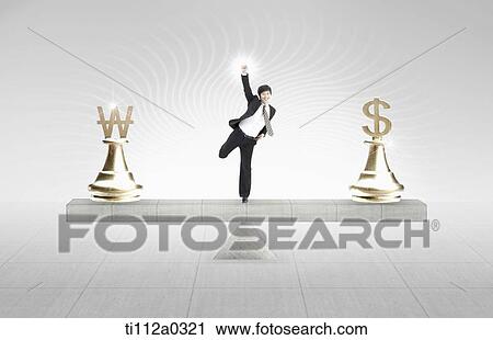 Stock Image - A businessman excited on the foreign currency scale. Fotosearch