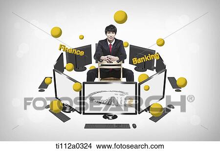 A businessman sitting around the monitors of finance and banking View Large Photo Image Picture - A businessman sitting around the monitors of finance and banking. Fotosearch