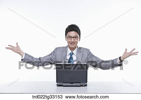 Stock Image - A businessman with open arms. Fotosearch