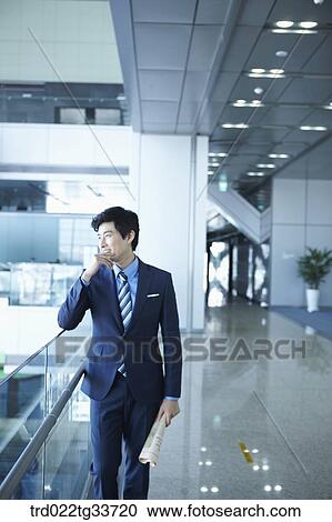 A businessman with the newspaper View Large Photo Image Stock Image - A businessman with the newspaper. Fotosearch