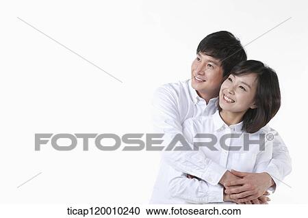 A couple hugging together View Large Photo Image Stock Image - A couple hugging together. Fotosearch