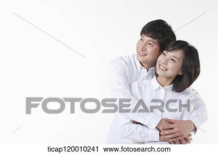 A couple hugging together View Large Photo Image Stock Image - A couple hugging together. Fotosearch