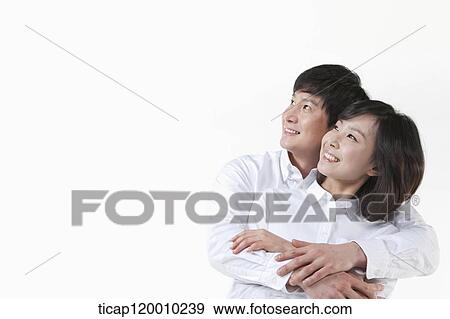 A couple hugging together View Large Photo Image Stock Photo - A couple hugging together. Fotosearch