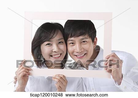 A couple in pink frame View Large Photo Image Stock Photo - A couple in pink frame. Fotosearch