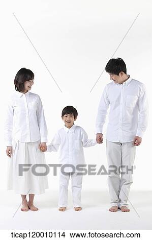Picture - A couple looking down on their son . Fotosearch