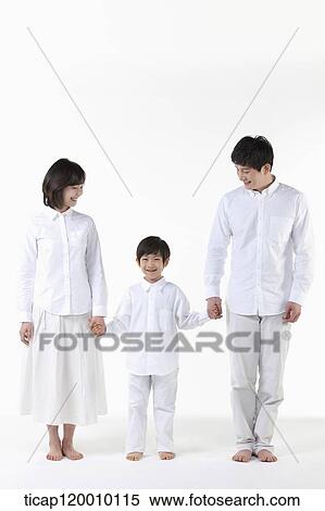 A couple looking down on their son View Large Photo Image Stock Photography - A couple looking down on their son . Fotosearch