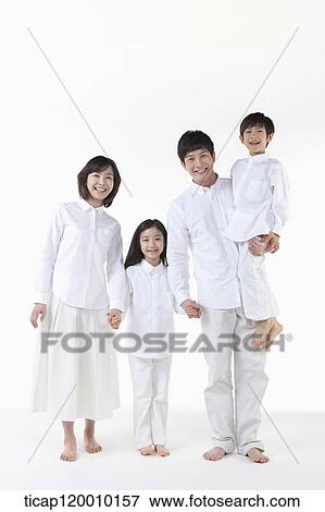 Stock Photo - A family holding hands together. Fotosearch