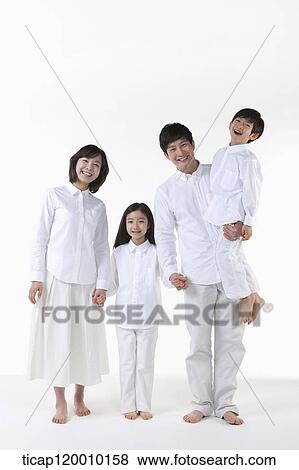 Stock Photo - A family holding hands together. Fotosearch