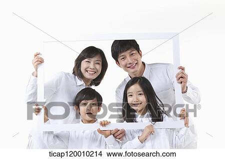 Picture - A family in the white frame. Fotosearch