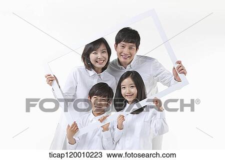 A family in the white frame View Large Photo Image Stock Image - A family in the white frame. Fotosearch