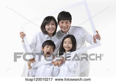 Stock Photo - A family in the white frame. Fotosearch