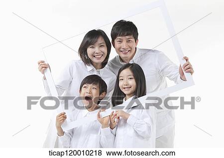 Stock Photo - A family in the white frame. Fotosearch