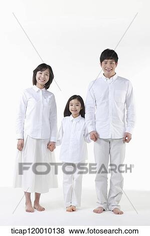 Stock Photo - A family in white shirt. Fotosearch