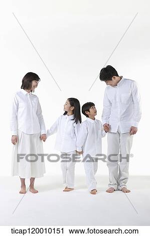 Stock Image - A family looking at each other. Fotosearch