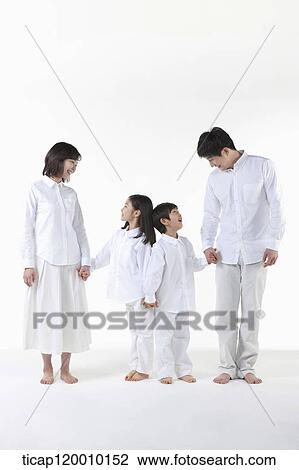 Stock Image - A family looking at each other. Fotosearch