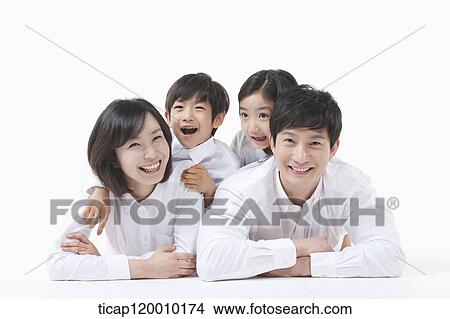 A family resting on the table View Large Photo Image Picture - A family resting on the table. Fotosearch