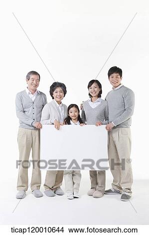 A family resting on the table View Large Photo Image Picture - A family resting on the table. Fotosearch
