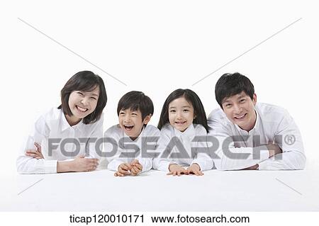A family resting on the table View Large Photo Image Stock Image - A family resting on the table. Fotosearch