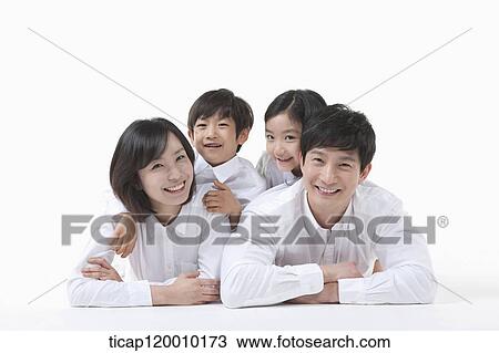 A family resting on the table View Large Photo Image Stock Image - A family resting on the table. Fotosearch