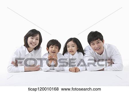 Stock Photo - A family resting on the table. Fotosearch
