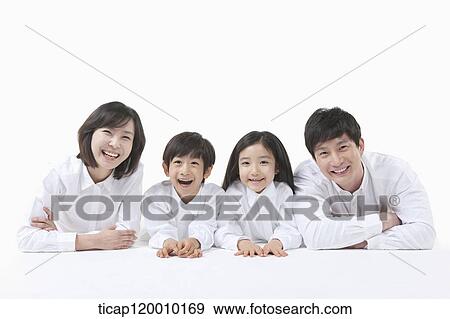 A family resting on the table View Large Photo Image Stock Photo - A family resting on the table. Fotosearch