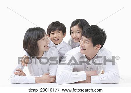 A family resting on the table View Large Photo Image Stock Photo - A family resting on the table. Fotosearch
