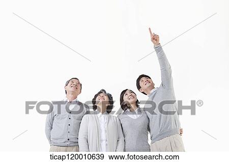 A family resting on the table View Large Photo Image Stock Photo - A family resting on the table. Fotosearch