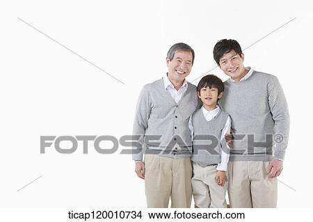 A family sitting on the couch View Large Photo Image Picture - A family sitting on the couch. Fotosearch