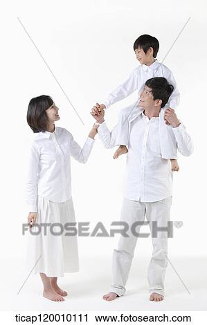 A family smiling together View Large Photo Image Stock Image - A family smiling together. Fotosearch