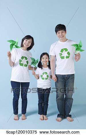 A family wearing recycling shirt with green pinwheel View Large Photo Image Stock Photography - A family wearing recycling shirt with green pinwheel. Fotosearch