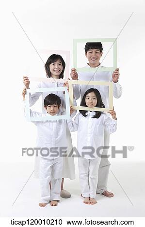 Stock Image - A family with colorful frames . Fotosearch