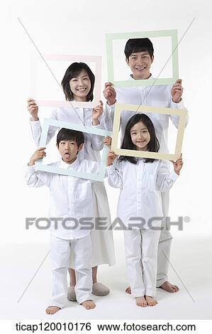 A family with colorful frames View Large Photo Image Stock Photograph - A family with colorful frames . Fotosearch