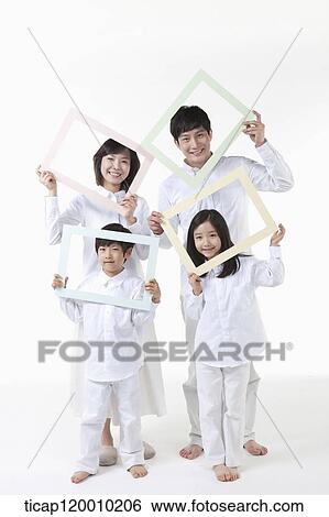 Stock Photograph - A family with colorful frames . Fotosearch