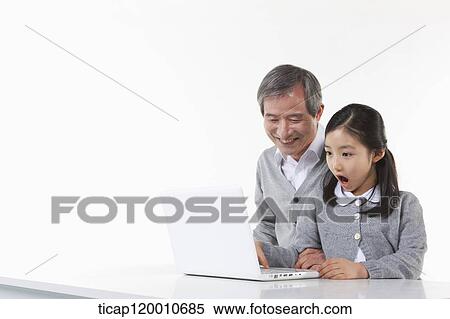 Stock Photography - A family with colorful frames . Fotosearch