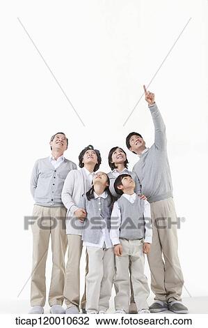 Stock Image - A family with their arms open. Fotosearch