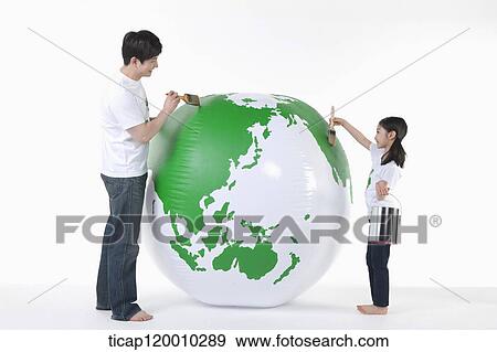 A father and daughter painting a green globe View Large Photo Image Stock Photo - A father and daughter painting a green globe. Fotosearch