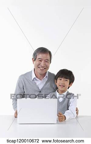 A father and son with a green frame View Large Photo Image Stock Image - A father and son with a green frame. Fotosearch