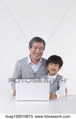 A father and son with a green frame View Large Photo Image Stock Image - A father and son with a green frame. Fotosearch