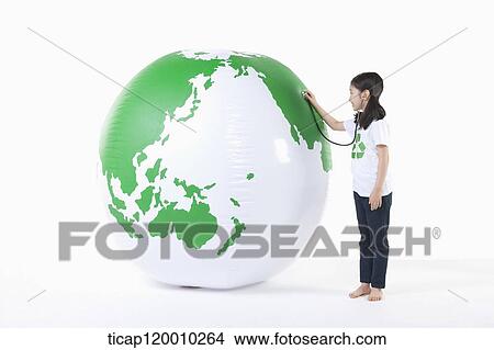 A girl caring a green globe View Large Photo Image Picture - A girl caring a green globe. Fotosearch
