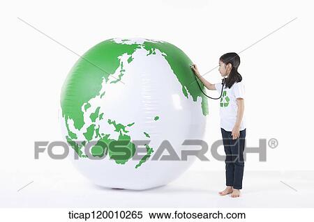 Stock Photography - A girl caring a green globe. Fotosearch