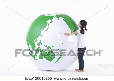 A girl hugging a green globe View Large Photo Image Stock Photography - A girl hugging a green globe. Fotosearch