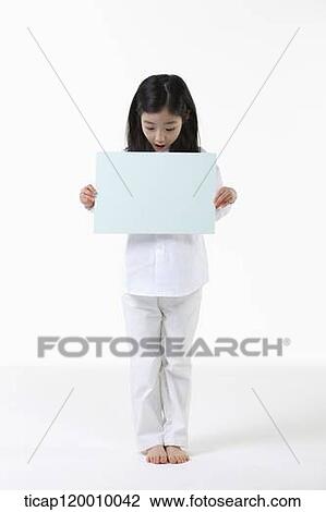 A girl looking down on white board View Large Photo Image Stock Image - A girl looking down on white board. Fotosearch