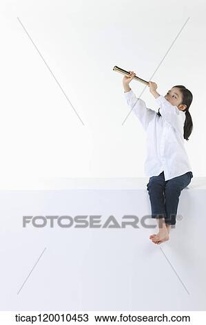 A girl looking the sky through the telescope View Large Photo Image Stock Image - A girl looking the sky through the telescope. Fotosearch