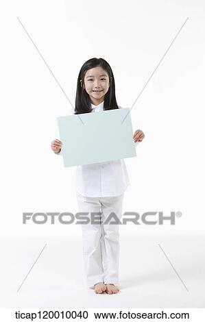 Stock Image - A girl smiling with white frame. Fotosearch
