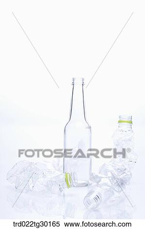 A glass bottle and other crumpled plastic bottles View Large Photo Image Stock Photography - A glass bottle and other crumpled plastic bottles. Fotosearch