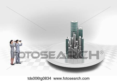 Picture - A man and woman looking at buildings with telescope. Fotosearch