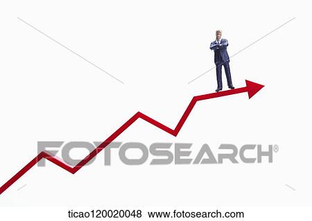 Stock Photo - A man figure on red rising chart. Fotosearch