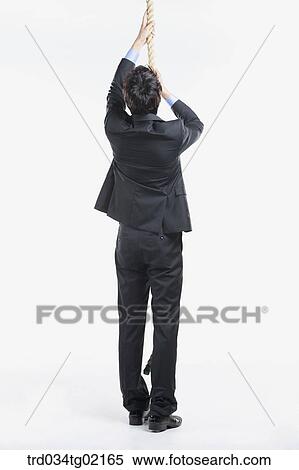 A man holding the rope View Large Photo Image Stock Photography - A man holding the rope . Fotosearch